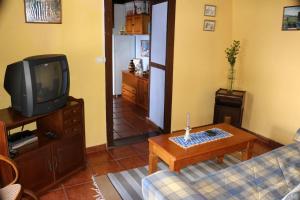Telewizja i/lub zestaw kina domowego w obiekcie Casa Asuncion
