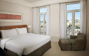 Кровать или кровати в номере K108 Hotel Doha