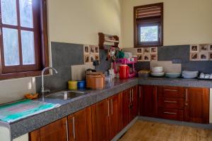 a kitchen with a sink and a counter top at Rose Villa by Kananke Hills in Kananke