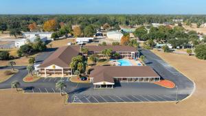 an aerial view of a resort with a pool at Super 8 by Wyndham Lake City in Lake City