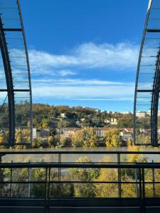 a view of a city from a bridge at Lyon Marriott Hotel Cité Internationale in Lyon +124 photos