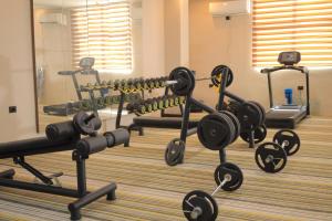 a gym with a bunch of exercise equipment in it at History Hotel in Dirē Dawa