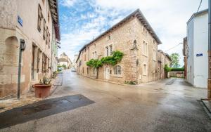 an empty street in an old stone building at Le Logis Tournusien in Tournus