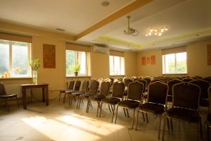 a room with chairs and a table and windows at VitaPark Sonyachnyy Provans in Satanov +111 photos