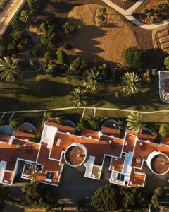 an overhead view of a house with trees and bushes at UNIO Ibiza - Adults Only in Cala Vadella