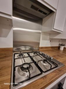 a stove top oven sitting inside of a kitchen at Beluca homes Acklam in Middlesbrough