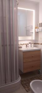 a bathroom with a shower and a sink at Home Sweet Home in Lavagna +52 photos