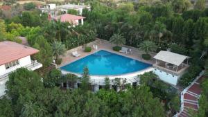 an overhead view of a swimming pool in a house at The HighGarden Resort in Udaipur