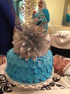 a blue cake is sitting on a table at The Cradle Berry Farm in Muldersdrift