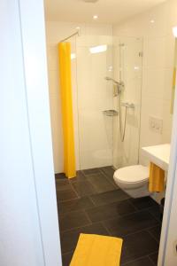 Ein Badezimmer in der Unterkunft Hotel Schoenau