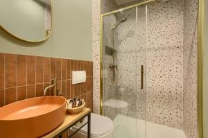 a bathroom with a sink and a glass shower at Cicho Sza in Tylicz +20 photos
