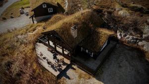 an overhead view of a house with people sitting on it at Great mountain cabin with 12 beds in Vågsli