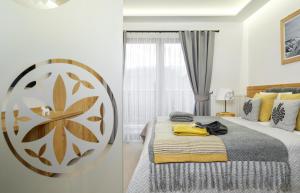 Posteľ alebo postele v izbe v ubytovaní Villa 11 Folk & Design
