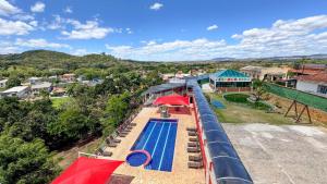 an aerial view of a water slide at a resort at Hotel do Papai Noel in Penedo