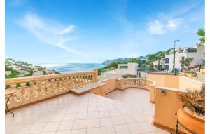 a balcony with a view of the ocean at Torre De Heretat in Canyamel