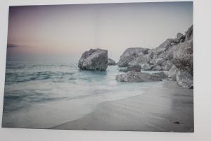 a large rock in the middle of the ocean at Oliver Wests Beautiful 1 Bedroom Retreat in Scarborough