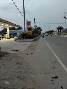 an empty road with a gas station on the side at Shree Balaji home stay Ayodhya contact number 92782-97365 in Ayodhya