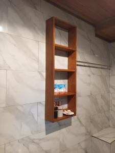 a wooden shelf on a wall in a room at H3 Hilltop Heaven in Ella +119 photos