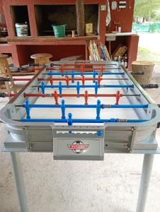 a ping pong table with six ping pong balls at Cabañas Nueve Alamos in Casa Grande