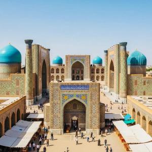 a large building with people walking in front of it at Anora home in Samarkand
