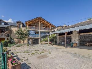 an exterior view of a large building with a courtyard at Cal 1777 in Bourg-Madame