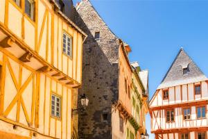 an alley between two buildings in a city at Camping Saint-Gildas-de-Rhuys in Saint-Gildas-de-Rhuys
