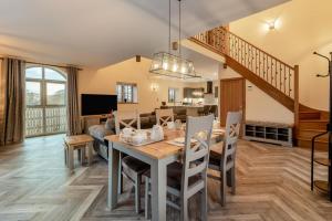 a dining room and living room with a table and chairs at 2 Bed in Brampton oc-c34637 in Brampton