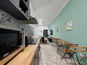 a row of tables and chairs in a restaurant at Cosyroom 3 in Pieta