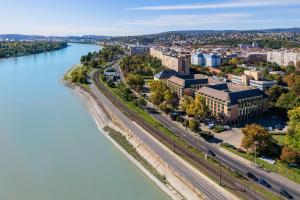 an aerial view of a city next to a river at Verdi Budapest Aquincum in Budapest