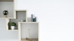 a white cabinet with a fan on top of it at Apartments King and Queen 2 in Povile