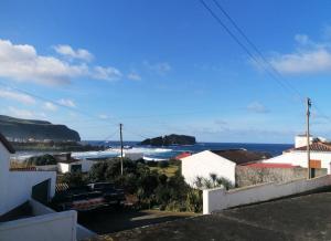 a view of the ocean from a house at Mosteiros Coastal Haven in Mosteiros