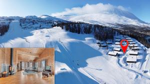 a ski resort with a snow covered mountain in the background at Gaustatoppen Hytteutleie in Gaustablikk