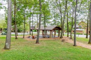 a pavilion in the middle of a park with trees at WISPer by Railey Vacations in McHenry
