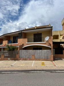 a house on the side of a street at Casa Nietta in Olbia