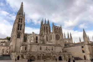a large cathedral with turrets and spires on at Hotel Cardeña by gaiarooms in Burgos +22 photos
