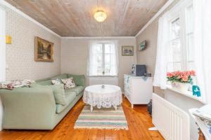 a living room with a couch and a table at HAL820-Unnaryd-Soedra-vaegen-29-a in Unnaryd