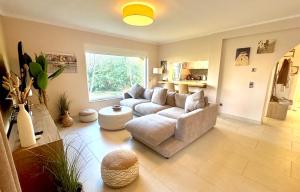 a living room with a couch and a table at Villa - Casa Ines in Cambrils +75 photos