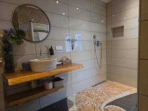 a bathroom with a sink and a mirror at Altstadt Speyer in Speyer +38 photos