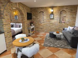 a living room with a couch and a table at Altstadt Speyer in Speyer