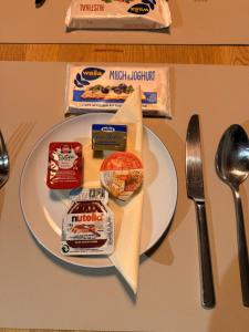 a plate with food on top of a table at Kuckucksnest in Ühlingen-Birkendorf