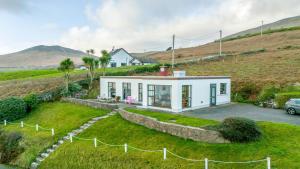 a house on the side of a hill at 3 Bed in Inch oc-i304 in Anascaul