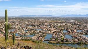 an aerial view of a city with a cactus at LivAway Suites Phoenix-Glendale in Glendale