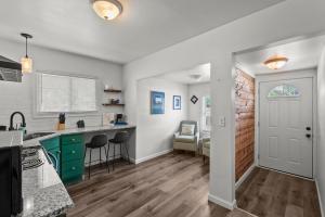a kitchen and dining room with a table and chairs at Mint Julep - Studio in Downtown Lexington in Lexington