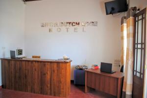 Area lobi atau resepsionis di Miura Dutch Edge Hotel