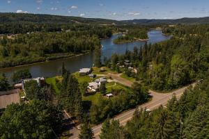 an aerial view of a town next to a river at The Basement Suite on Paradise Hill in Prince George