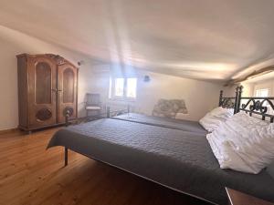 a bedroom with two beds and a dresser at Villa Doba - Visnjan in Višnjan +47 photos