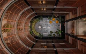 an overhead view of a circular room with plants at Volga, Member of Preferred Hotels & Resorts in Mexico City