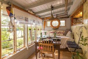 a living room with a table and a couch at BLE849-Ronneby-Rustorpsvaegen-1 in Ronneby