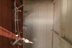 a shower in a room with a wall at BLE849-Ronneby-Rustorpsvaegen-1 in Ronneby