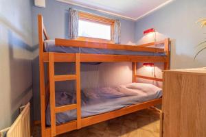 a couple of bunk beds in a room at KRO891-Hallaryd-Kalvshult-8 in Hallaryd